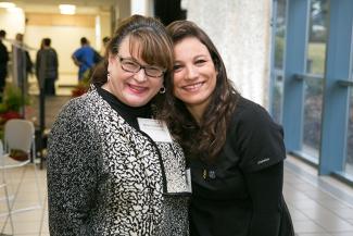 Photo of Michele Lesmeister and Sarra Ghezzaz, former ESL student who is about to graduate as a dental assistant.