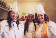 Culinary students in their chef's regalia during Commencement